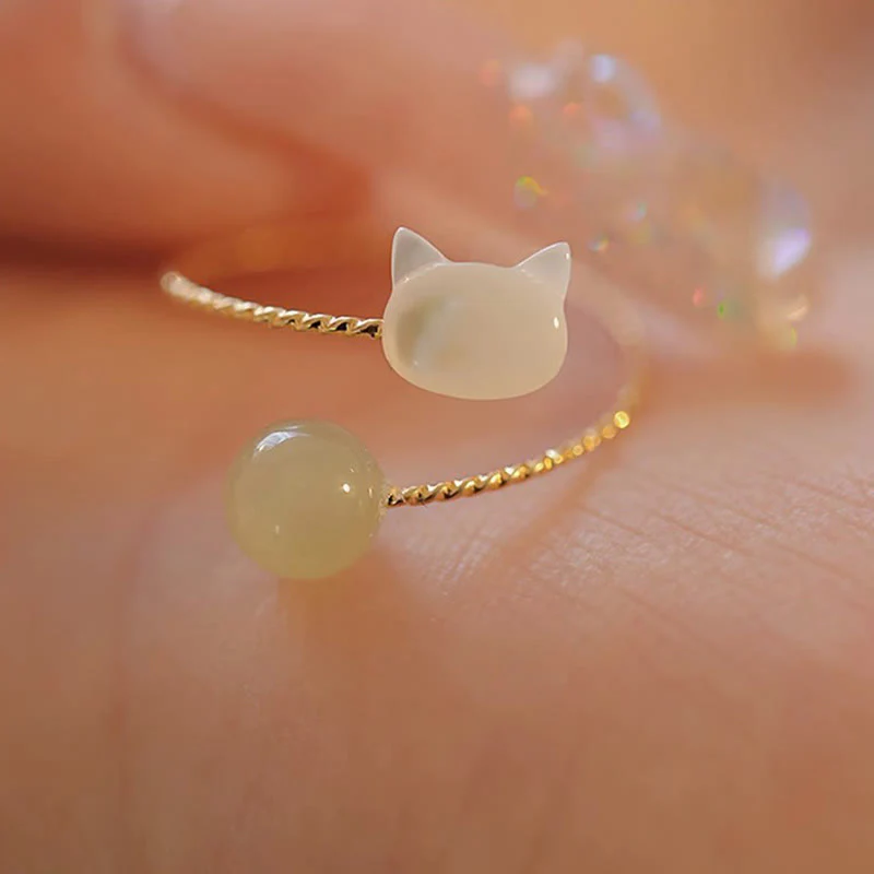 Anello di benedizione con perline di giada e testa di gatto in pietra tridacna Buddha Stones