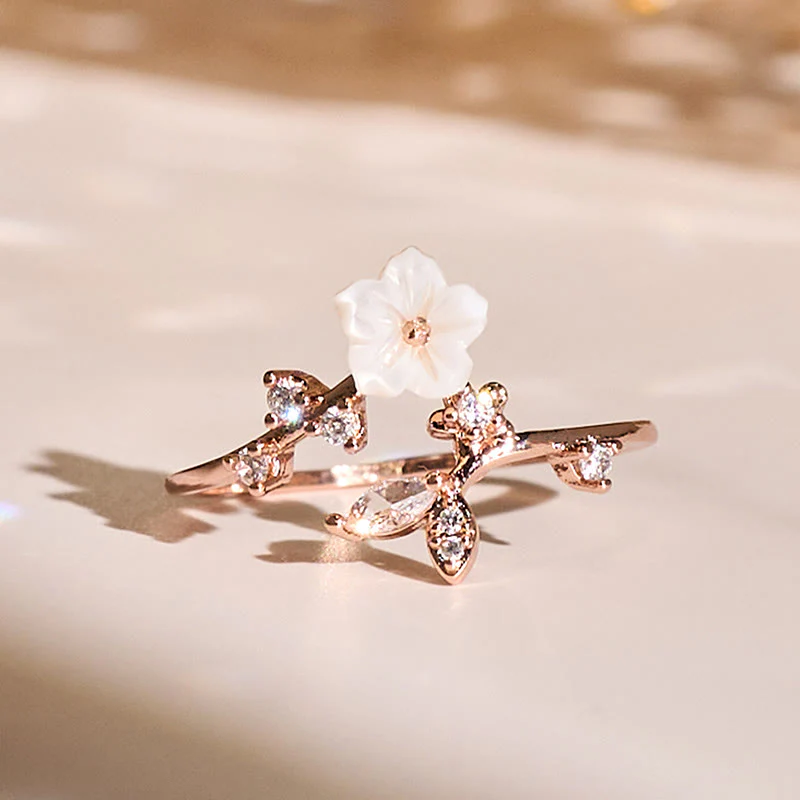 Anello di rame curativo regolabile con motivo a fiori bianchi Buddha Stones