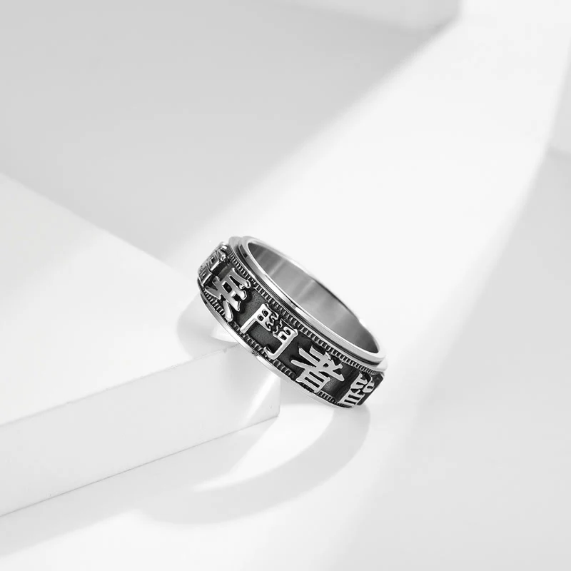 Anello girevole in acciaio al titanio con parole in equilibrio e calma - Image 2