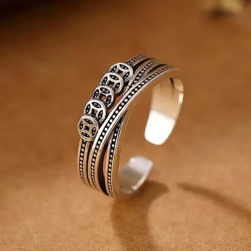 Anello portafortuna con moneta di rame