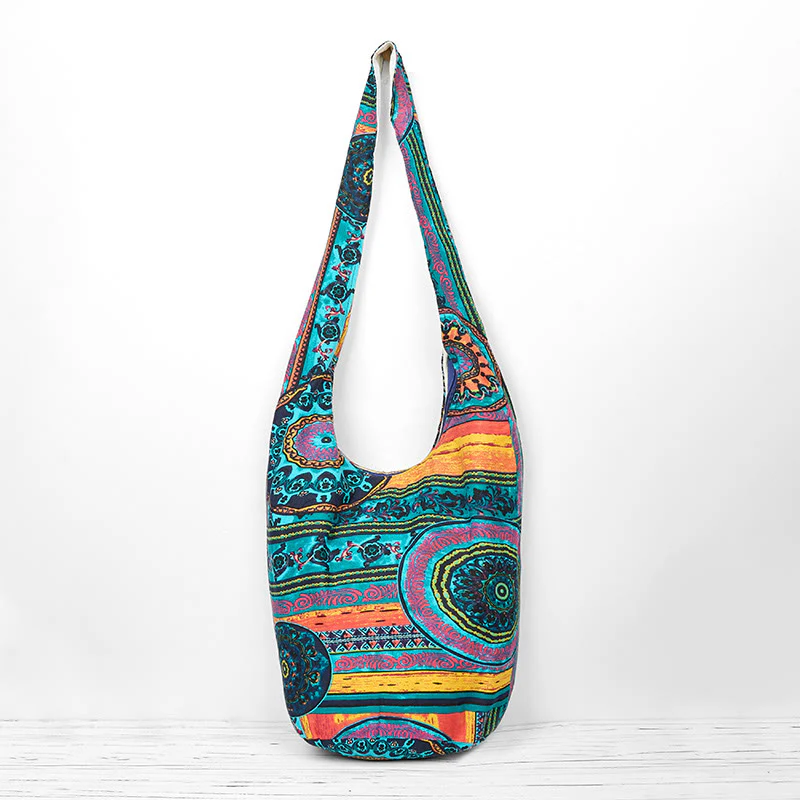 Borsa a tracolla in cotone con motivo a fiori blu Buddha Stones