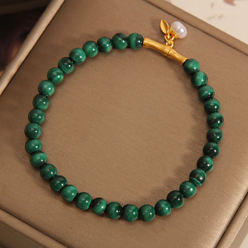 Bracciale anti-ansia in bambù portafortuna con perle di malachite naturale Buddha Stones - Image 2