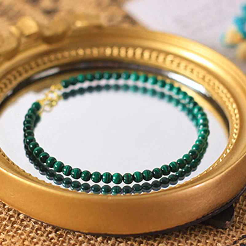 Bracciale anti-ansia in rame placcato oro 14k con perline di malachite naturale da 4 mm Buddha Stones - Image 10