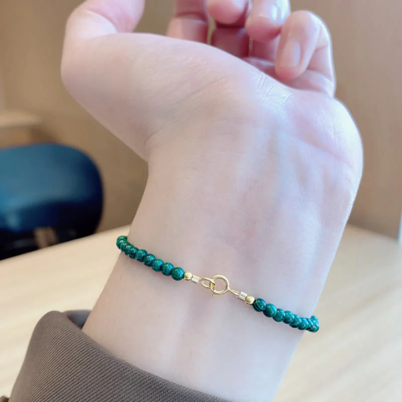 Bracciale anti-ansia in rame placcato oro 14k con perline di malachite naturale da 4 mm Buddha Stones - Image 13