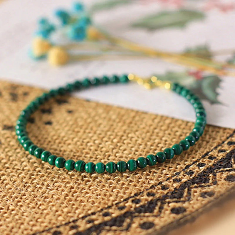 Bracciale anti-ansia in rame placcato oro 14k con perline di malachite naturale da 4 mm Buddha Stones - Image 4