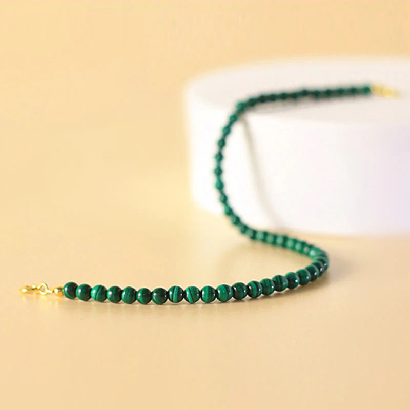 Bracciale anti-ansia in rame placcato oro 14k con perline di malachite naturale da 4 mm Buddha Stones - Image 5