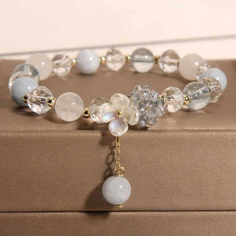 Bracciale Buddha Stones con pietra occhio di gatto gialla e acquamarina, fiore e pace