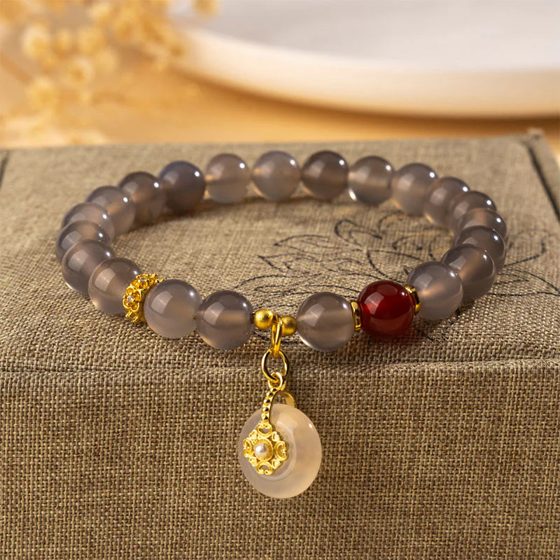 Bracciale Buddha Stones in agata grigia, agata rossa, calcedonio