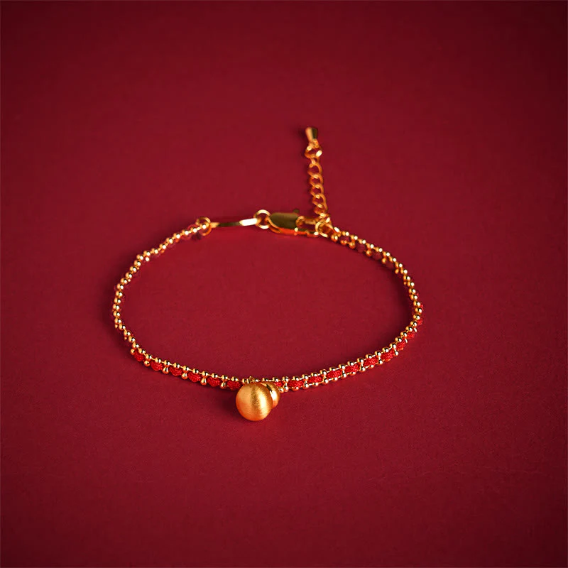 Bracciale Buddha Stones in corda rossa, rame e ottone, zucca, forza e ricchezza