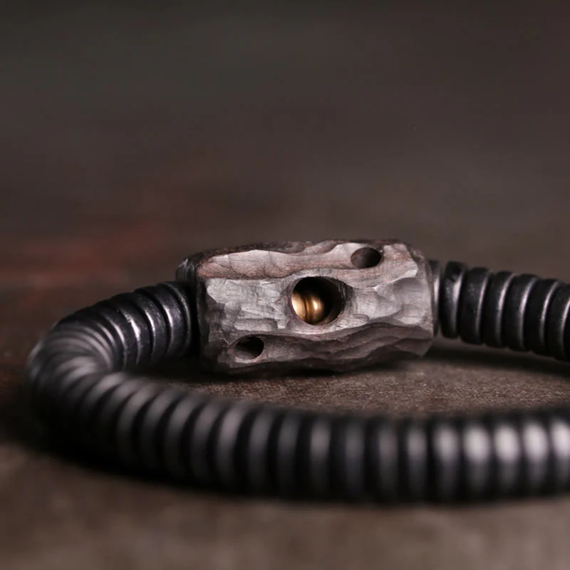 Bracciale Buddha Stones in legno di ebano, rame e ottone con fori per l'equilibrio - Image 3