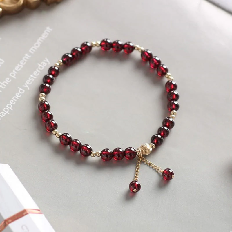 Bracciale Buddha Stones in lega placcata oro 14K con granato naturale e calma - Image 3