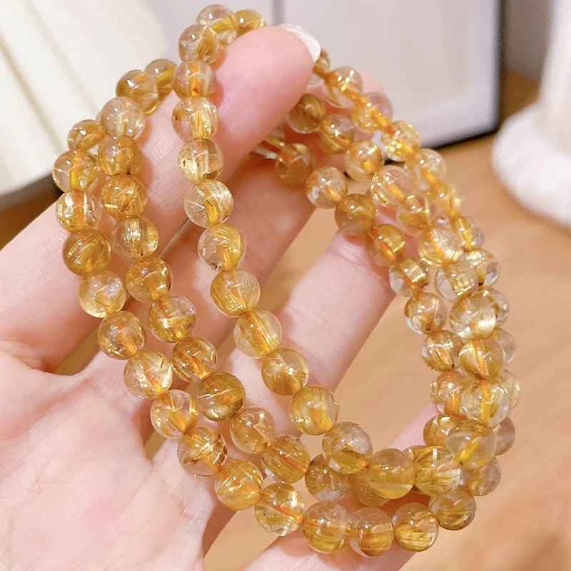 Bracciale Buddha Stones in oro naturale, quarzo rutilato, pietra del sole, cianite, ricchezza - Image 5