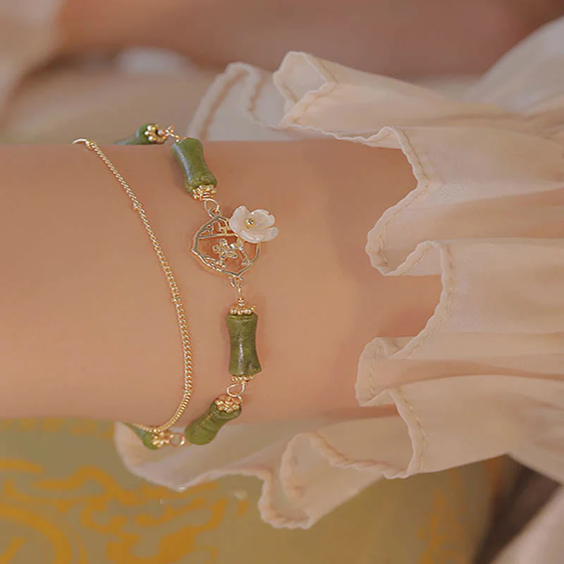 Bracciale Buddha Stones in rame placcato oro 14k con fiore di bambù, peridoto e doppio strato di ricchezza - Image 7