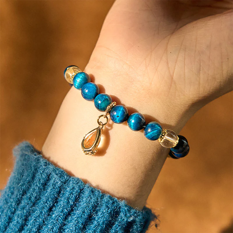Bracciale Buddha Stones Occhio di Tigre Blu Cristallo Bianco Goccia d'Acqua Forza - Image 4