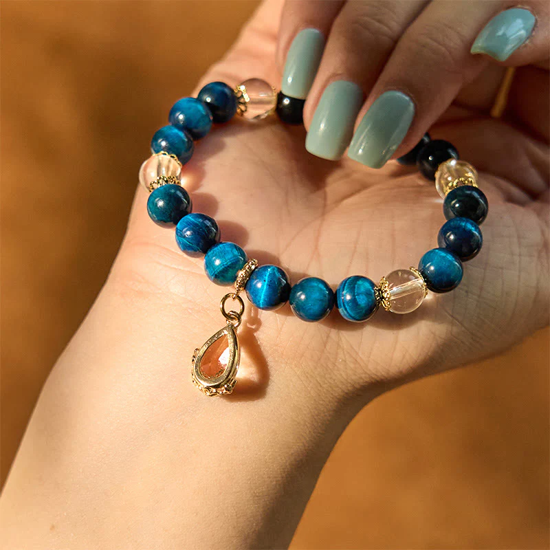 Bracciale Buddha Stones Occhio di Tigre Blu Cristallo Bianco Goccia d'Acqua Forza - Image 5