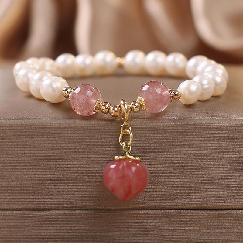 Bracciale con ciondolo a forma di cuore, amore, saggezza, perle naturali, quarzo fragola e pesca Buddha Stones - Image 6