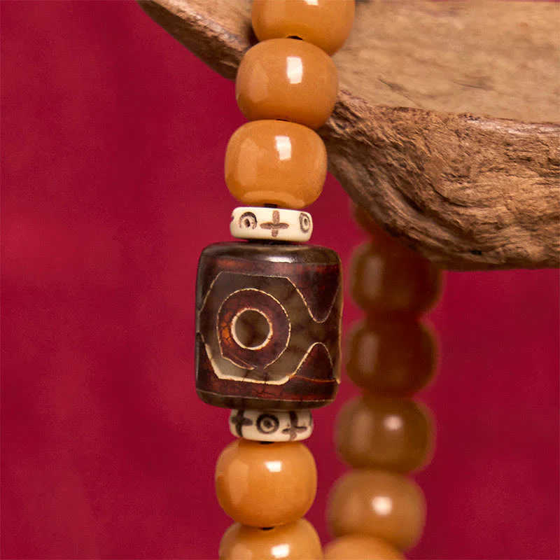 Bracciale con perline Dzi e semi di Bodhi tibetani di Buddha Stones, per tenere lontani gli spiriti maligni - Image 4