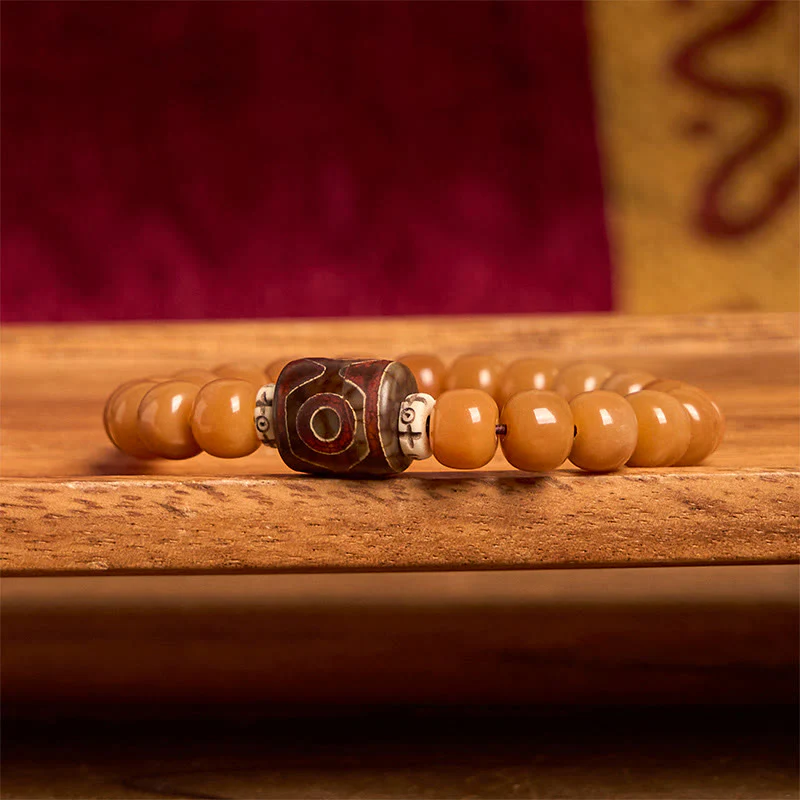 Bracciale con perline Dzi e semi di Bodhi tibetani di Buddha Stones, per tenere lontani gli spiriti maligni - Image 5