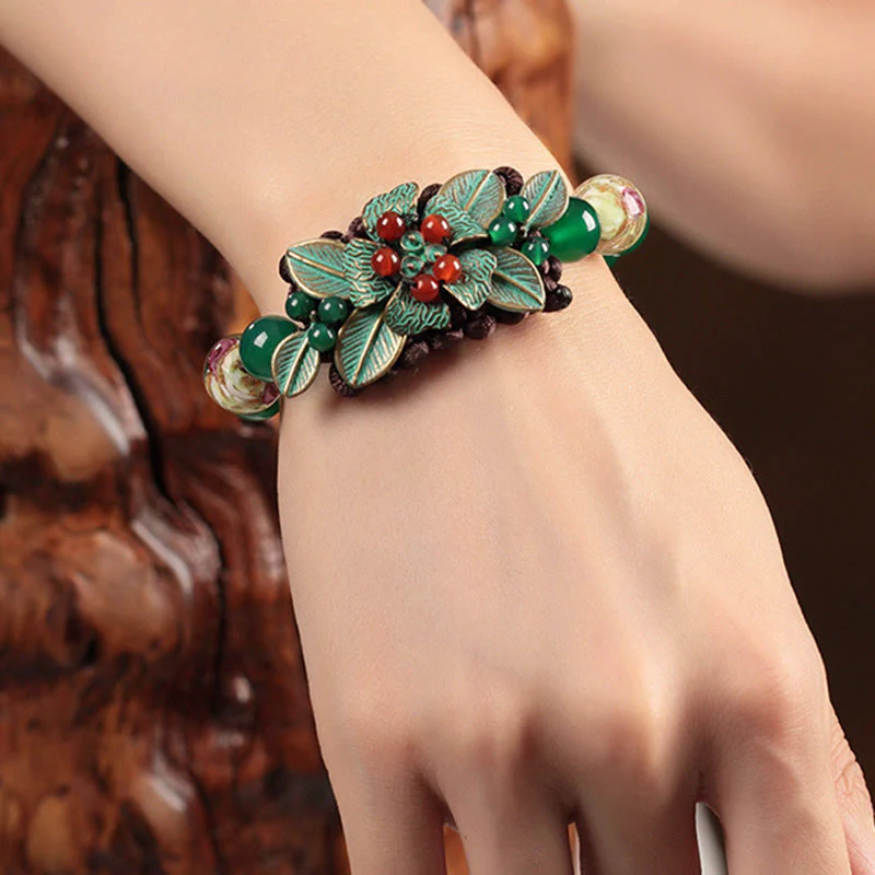Bracciale con supporto a nodo intrecciato in perline di vetro agata verde Buddha Stones - Image 4
