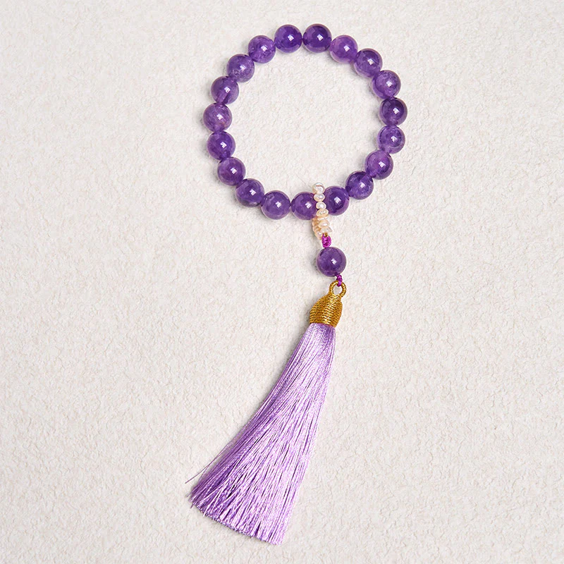 Bracciale da meditazione con nappe e perle di ametista naturale Buddha Stones