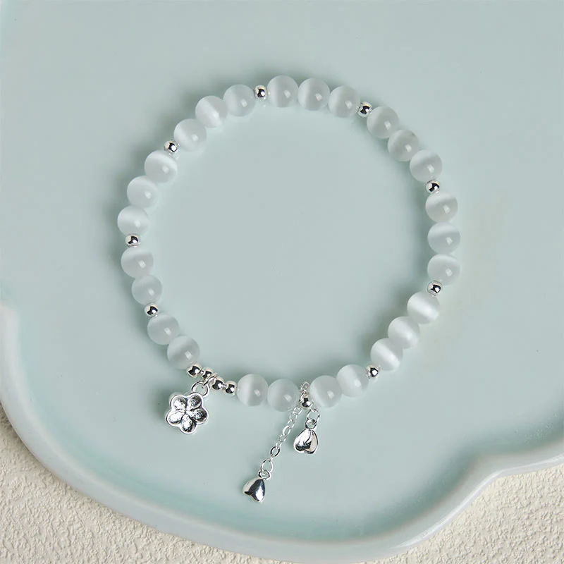 Bracciale della pace con fiori di ciliegio e occhio di gatto naturale Buddha Stones - Image 4