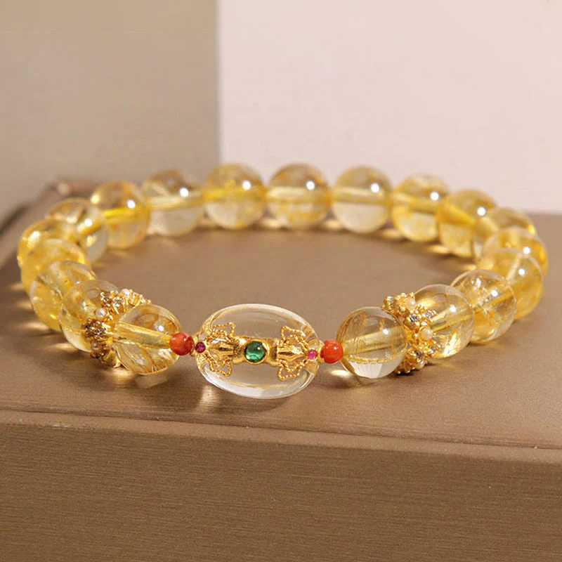 Bracciale di buon auspicio con perle di quarzo rutilato dorato naturale Buddha Stones