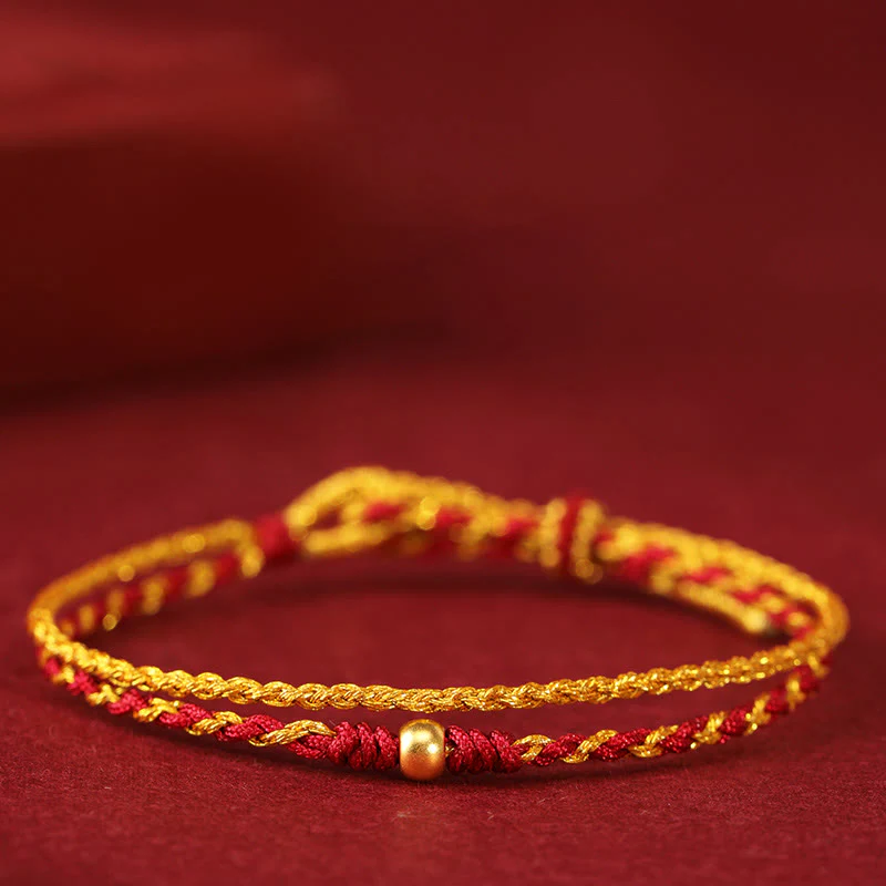 Bracciale intrecciato con Buddha Stones in oro 999 e moneta di rame a doppio giro, con cordino rosso dorato