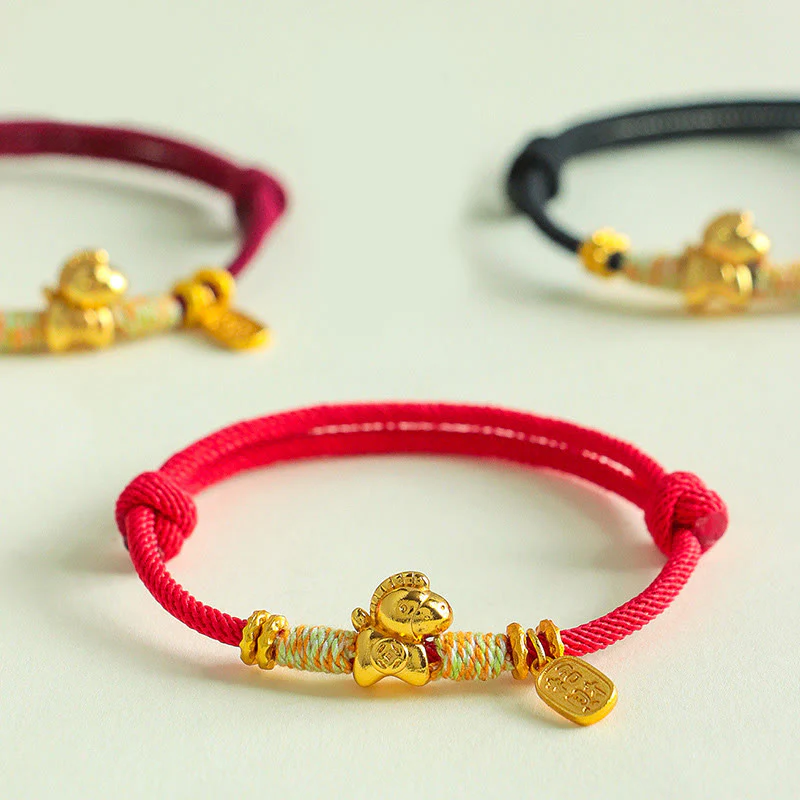 Bracciale intrecciato con ciondolo portafortuna e cordino rosso e nero dell'anno del cavallo Buddha Stones