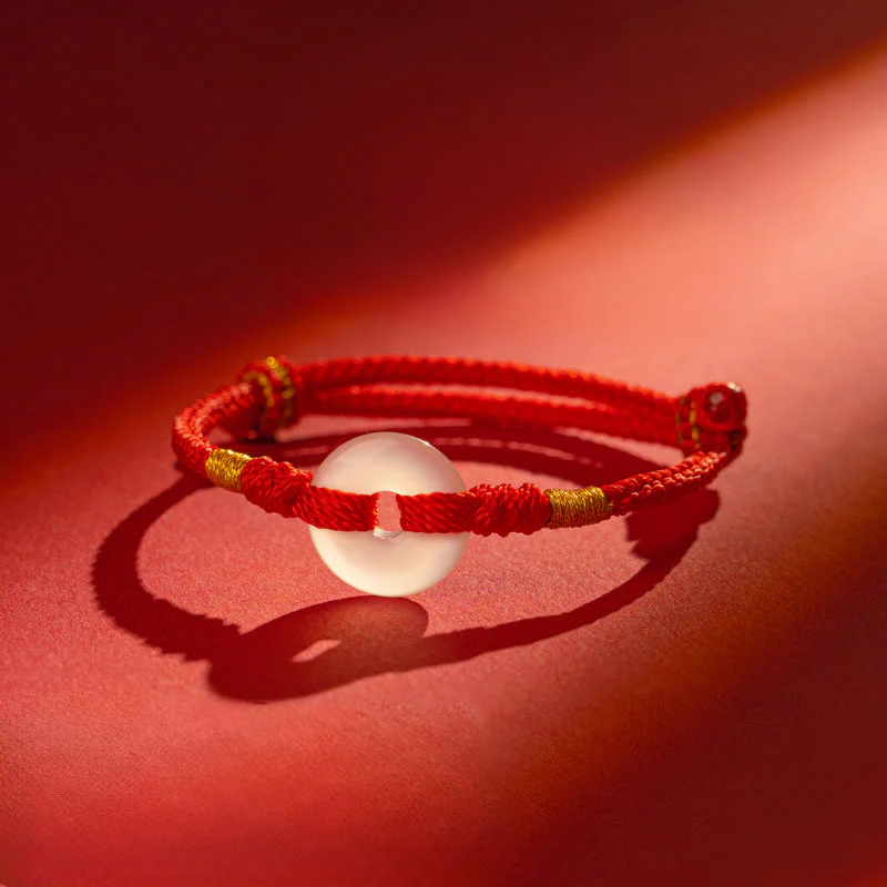 Bracciale intrecciato con fibbia della pace in calcedonio bianco Buddha Stones