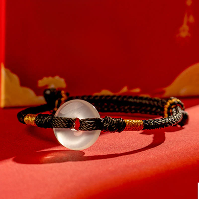 Bracciale intrecciato con fibbia della pace in calcedonio bianco Buddha Stones - Image 13