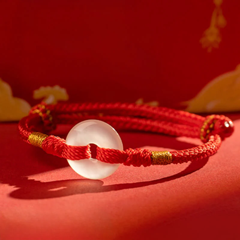 Bracciale intrecciato con fibbia della pace in calcedonio bianco Buddha Stones - Image 2