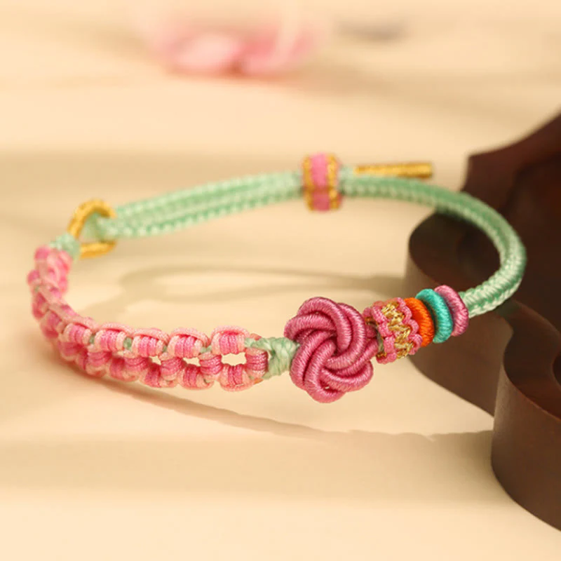 Bracciale intrecciato con nodo in fiore di pesco rosa e verde fatto a mano Buddha Stones - Image 3