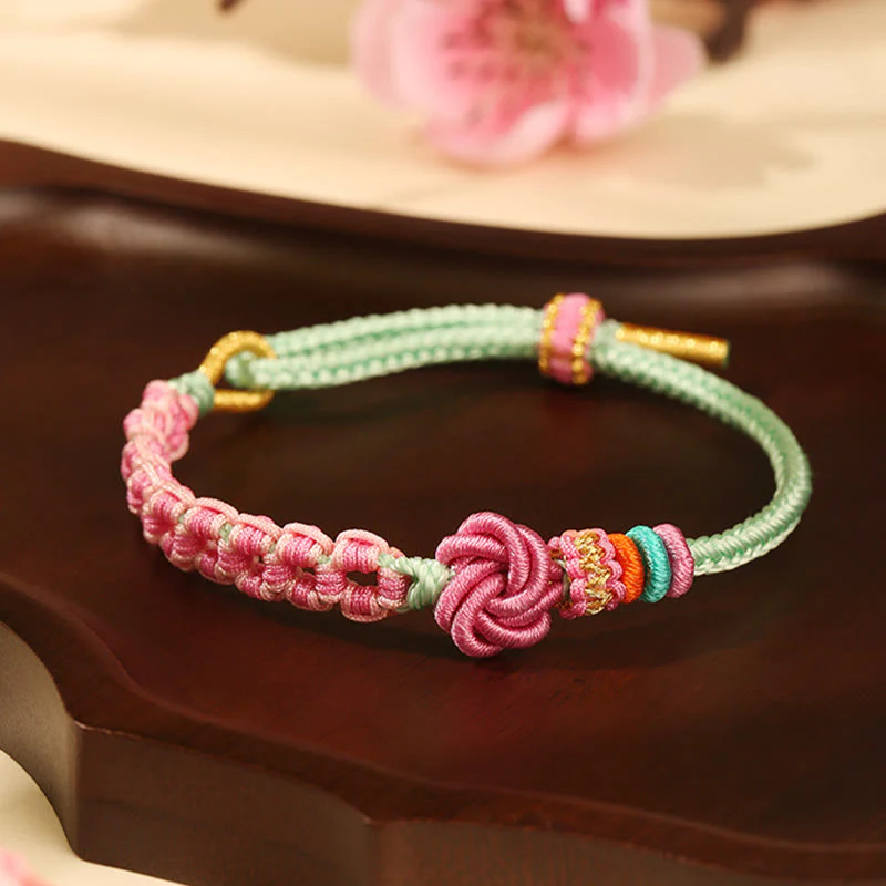 Bracciale intrecciato con nodo in fiore di pesco rosa e verde fatto a mano Buddha Stones - Image 4