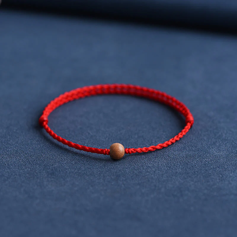 Bracciale intrecciato con perline di legno di pesca naturale Buddha Stones che allontanano gli spiriti maligni - Image 2