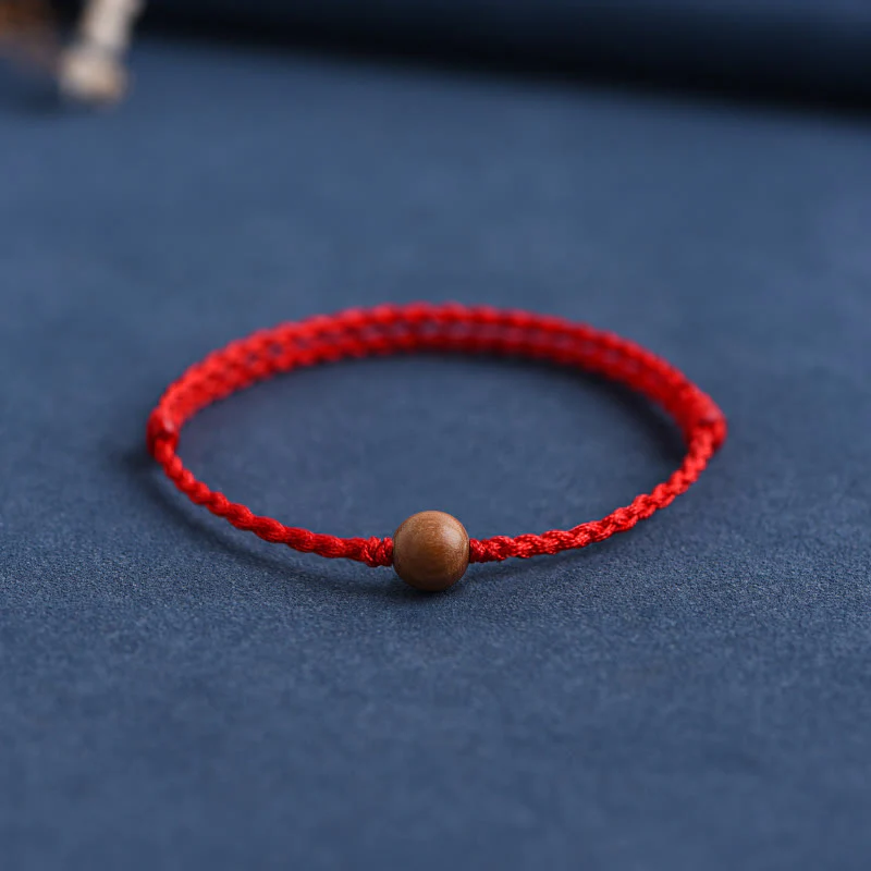 Bracciale intrecciato con perline di legno di pesca naturale Buddha Stones che allontanano gli spiriti maligni - Image 7