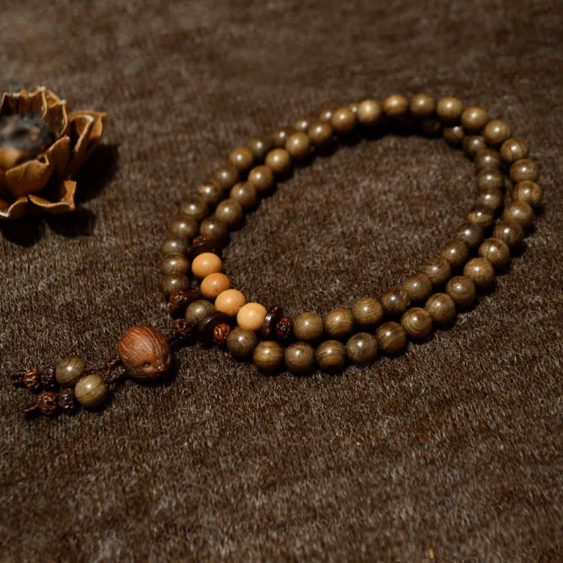 Bracciale Mala con ciondolo di protezione in legno di sandalo tibetano Buddha Stones - Image 2