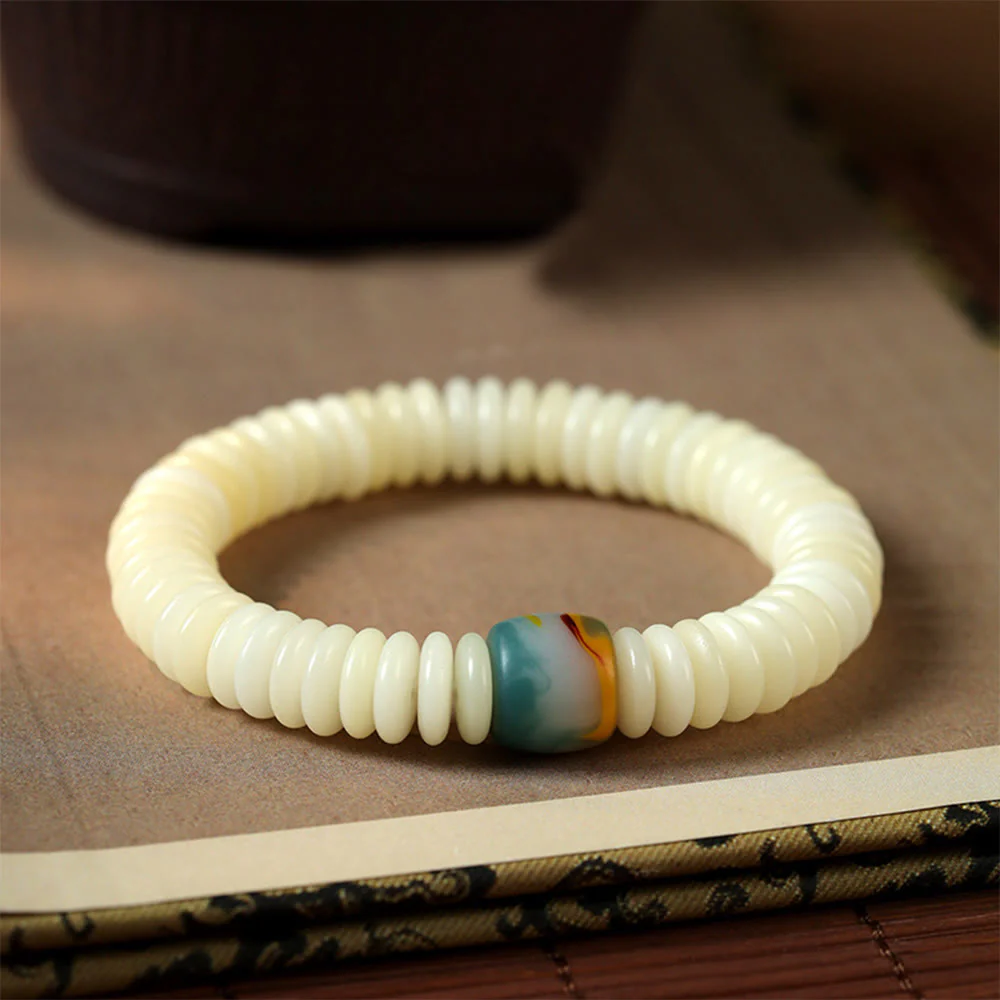Braccialetto con nappa e semi di Bodhi bianchi naturali, pietra della saggezza Buddha Stones.