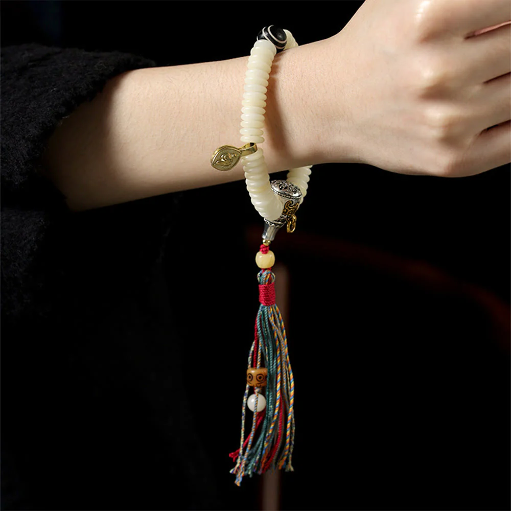 Braccialetto con nappa e semi di Bodhi bianchi naturali, pietra della saggezza Buddha Stones. - Image 11