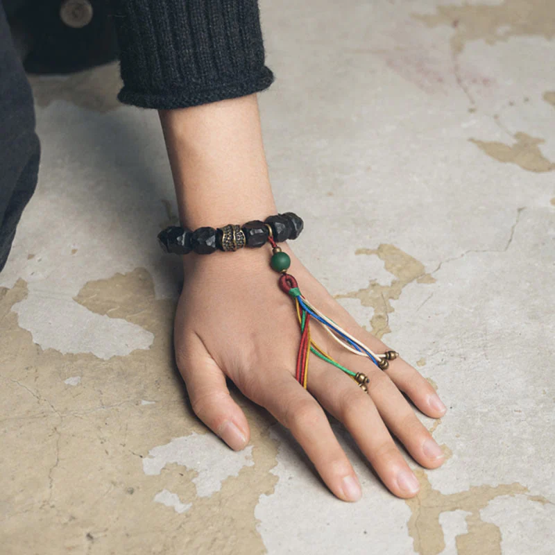 Bracciale Mala da polso con nappa in legno di Buddha Stones tibetano e rame della pace - Image 11