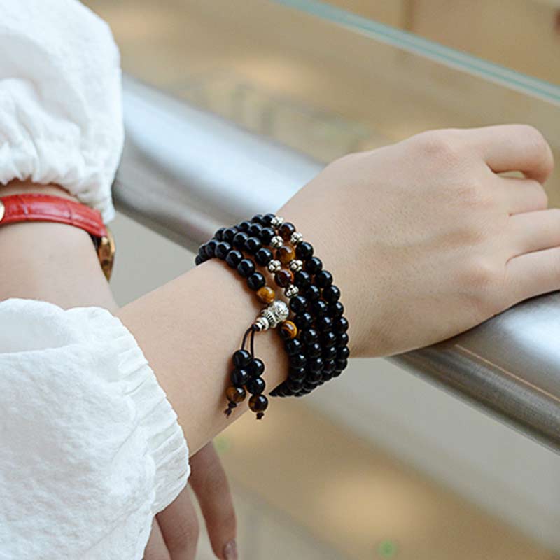 Bracciale Mala di benedizione con occhio di tigre e ossidiana nera Buddha Stones - Image 3