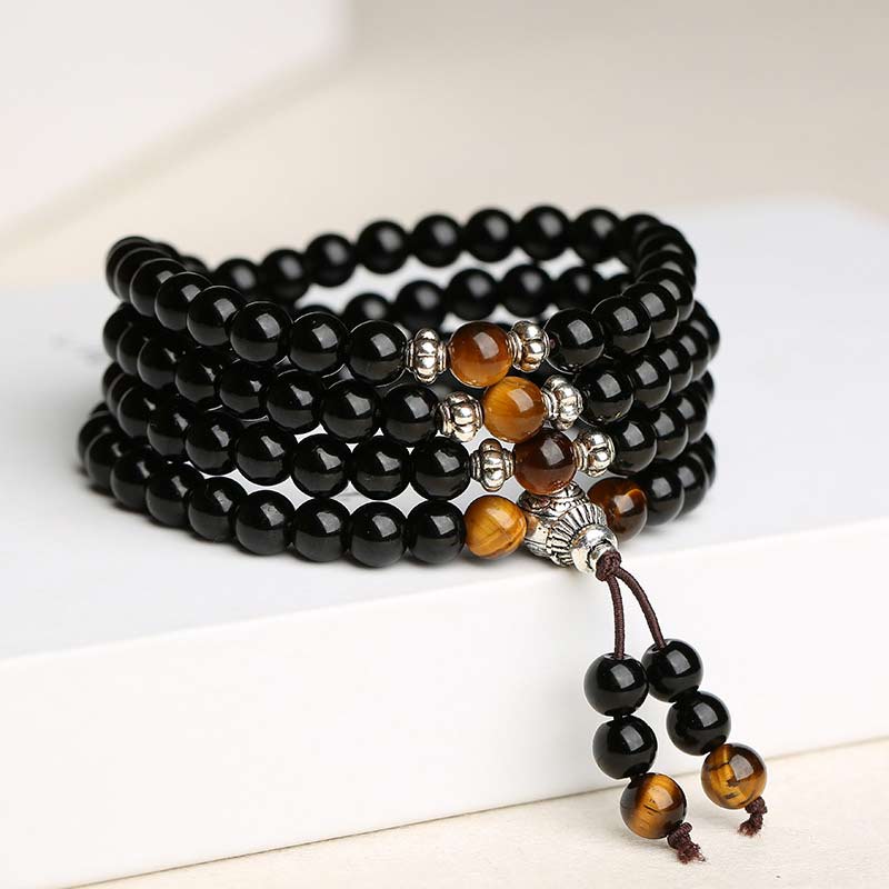 Bracciale Mala di benedizione con occhio di tigre e ossidiana nera Buddha Stones - Image 4