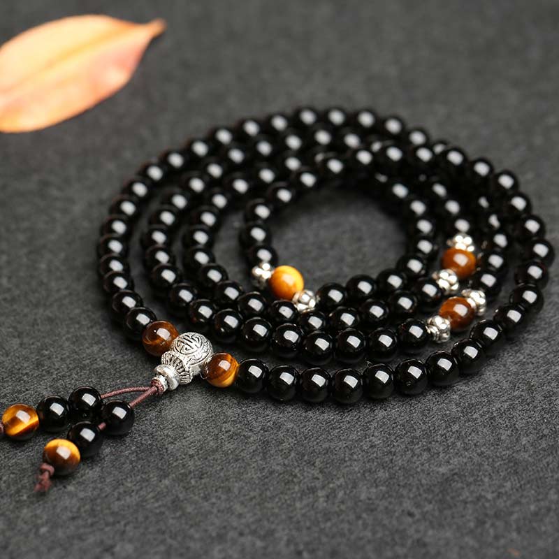 Bracciale Mala di benedizione con occhio di tigre e ossidiana nera Buddha Stones - Image 5