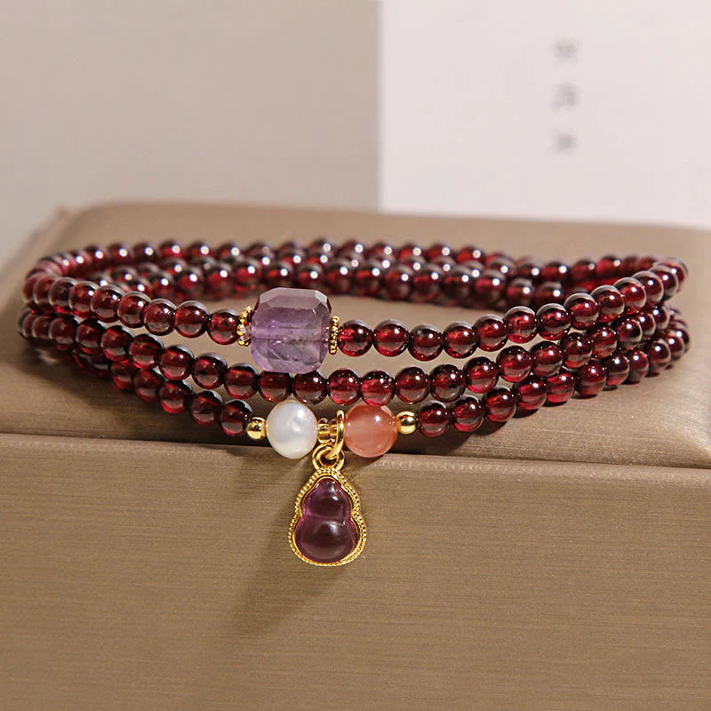 Bracciale multistrato con protezione in granato naturale, ametista e zucca Buddha Stones