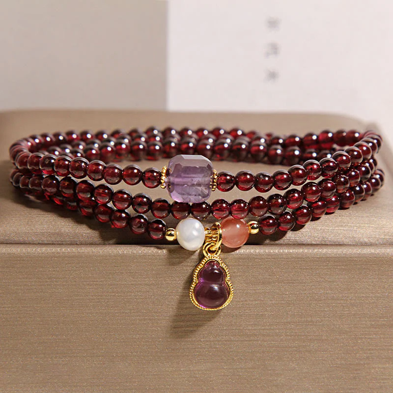 Bracciale multistrato con protezione in granato naturale, ametista e zucca Buddha Stones - Image 4