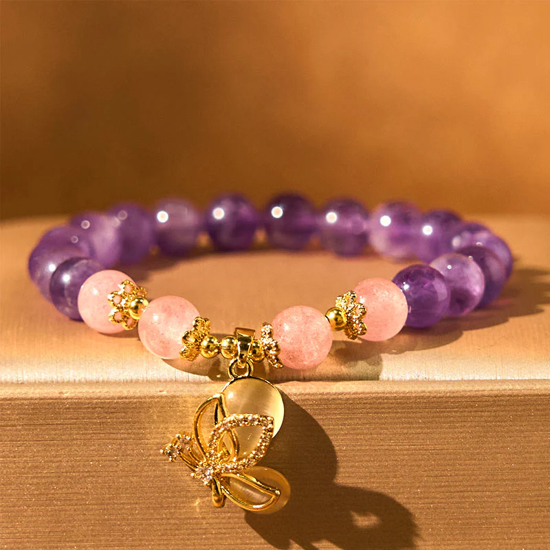 Braccialetto con ciondolo a farfalla in cristallo di quarzo fragola e ametista naturale Buddha Stones