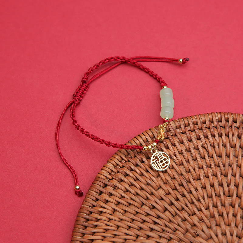 Braccialetto con corda rossa con ciondolo a forma di carattere Fu, con perline di giada lavorate a mano Buddha Stones - Image 2