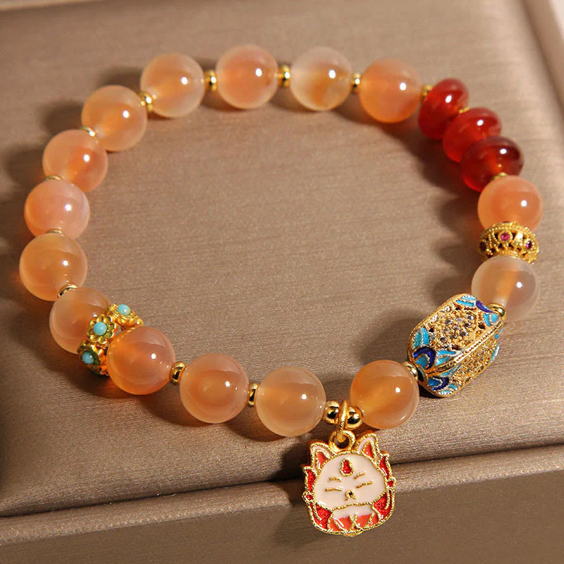 Braccialetto curativo in agata arancione caramellata naturale con volpe a nove code Buddha Stones - Image 7