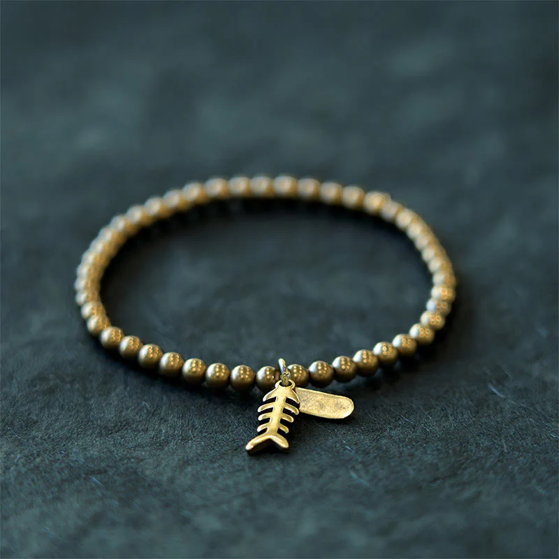 Braccialetto curativo in rame con ossi di pesce Buddha Stones - Image 9