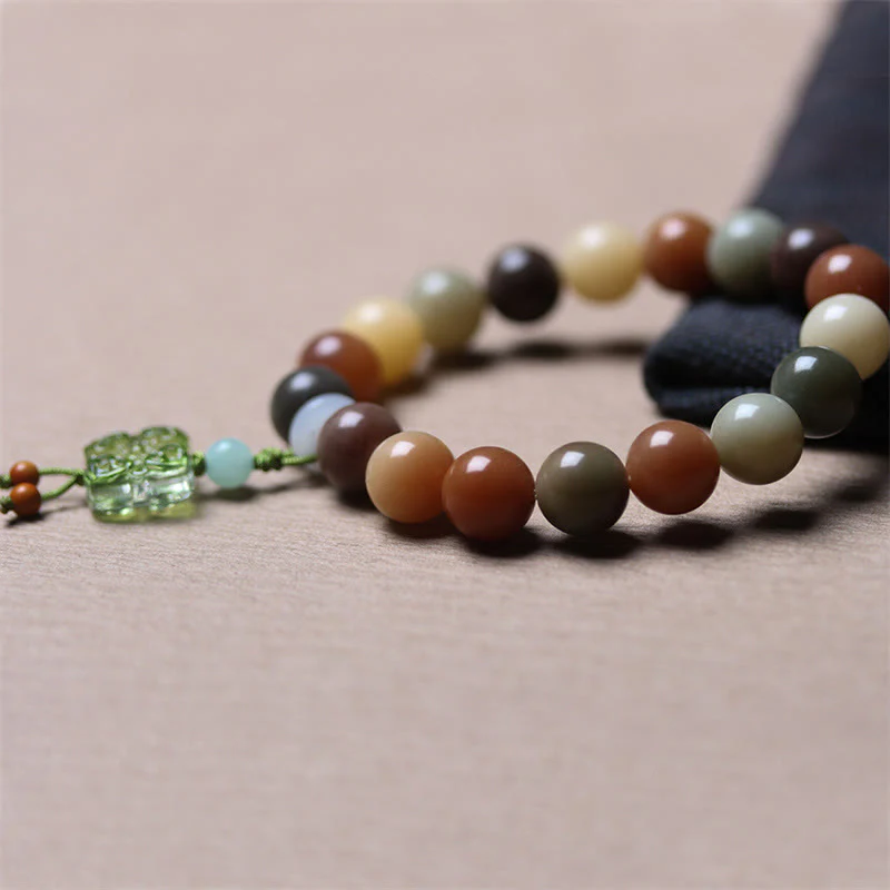 Braccialetto della pace con ciondolo in vetro Liuli con semi di Bodhi multicolore sfumato naturale Buddha Stones - Image 15