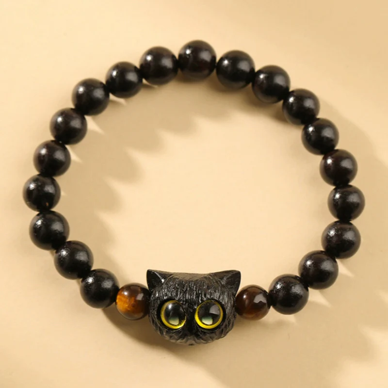 Braccialetto della pace con motivo a testa di gatto in legno di ebano Buddha Stones
